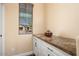 Additional counter space with storage, perfect for organization and added convenience at 12663 W Pinnacle Vista Dr, Peoria, AZ 85383