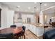 Bright kitchen featuring stainless steel appliances, a center island with granite countertops at 12663 W Pinnacle Vista Dr, Peoria, AZ 85383