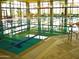 Indoor swimming pool with clear water and large windows at 12663 W Pinnacle Vista Dr, Peoria, AZ 85383