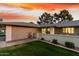 Charming single-story home featuring a spacious two-car garage and well-maintained landscaping with mature trees at 12703 W Shadow Hills Dr, Sun City West, AZ 85375