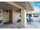 Inviting outdoor patio with a seating area, offering a space for relaxation at 12703 W Shadow Hills Dr, Sun City West, AZ 85375