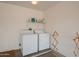 Laundry room with full size washer and dryer and drying rack at 15642 W Arbor Trl, Surprise, AZ 85374