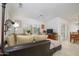 Inviting living room with comfortable seating, ample natural light, and stylish decor at 15642 W Arbor Trl, Surprise, AZ 85374