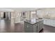 Open kitchen view with granite countertops, stainless steel appliances, and natural lighting at 16035 N 159Th Dr, Surprise, AZ 85374