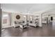Inviting living room featuring tile floors, neutral paint, a ceiling fan, and an open floor plan at 16035 N 159Th Dr, Surprise, AZ 85374