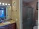 Bathroom with a shower and marble-topped sink, perfect for a relaxing home at 16657 E Gunsight Dr # 182, Fountain Hills, AZ 85268