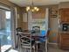 This dining area features a lovely chandelier and beautiful natural lighting at 16657 E Gunsight Dr # 182, Fountain Hills, AZ 85268