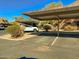 Covered parking spaces with well-maintained landscaping and easy access to units at 16657 E Gunsight Dr # 182, Fountain Hills, AZ 85268