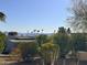 Mountain view from the property with lush landscaping and palm trees at 16657 E Gunsight Dr # 182, Fountain Hills, AZ 85268