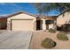 Charming single-story home featuring a two-car garage and low maintenance desert landscaping at 17350 W Adams St, Goodyear, AZ 85338