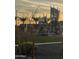 Community playground with modern play structures and lush landscaping at 17622 W Missouri Ave, Litchfield Park, AZ 85340