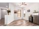 Charming breakfast nook with natural light, wood-look floors, and a convenient mini-fridge, perfect for casual dining at 18813 N Summerbreeze Way, Surprise, AZ 85374