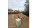 Backyard featuring a firepit, pergola, and built-in benches at 1953 W Granada Rd, Phoenix, AZ 85009