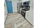 Modern kitchen featuring stainless steel appliances, stylish tile backsplash, and easy access to the adjacent room at 1953 W Granada Rd, Phoenix, AZ 85009