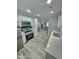 Well-lit kitchen featuring stainless steel appliances, white cabinetry, and modern countertops at 1953 W Granada Rd, Phoenix, AZ 85009