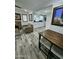 Open-concept layout with a living room flowing into a modern kitchen, perfect for entertaining and Gathering gatherings at 1953 W Granada Rd, Phoenix, AZ 85009