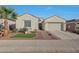 Charming single-story home with desert landscaping, two-car garage, and a welcoming entrance at 20012 W Campbell Ave, Buckeye, AZ 85396