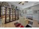 Bright hobby room featuring display cases and light wood look floors at 20012 W Campbell Ave, Buckeye, AZ 85396