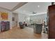 Spacious living room with ample seating and wood-look tile flooring at 20012 W Campbell Ave, Buckeye, AZ 85396