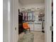 Organized walk-in closet featuring built-in shelves, drawers, and ample storage at 20012 W Campbell Ave, Buckeye, AZ 85396