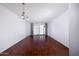 Spacious room with hardwood floors and sliding glass doors to the backyard at 2401 N 70Th St # G, Scottsdale, AZ 85257