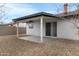 Backyard showcasing covered patio, rock landscaping and home architecture at 2593 E Commonwealth Cir, Chandler, AZ 85225