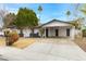 This home features a carport and well-maintained landscaping at 2593 E Commonwealth Cir, Chandler, AZ 85225