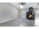 Spacious living room with a skylight and statement brick fireplace at 2593 E Commonwealth Cir, Chandler, AZ 85225