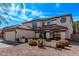Charming two-story home with a tile roof, well-manicured lawn, and desert landscaping at 28422 N 32Nd Ln, Phoenix, AZ 85083