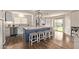 Kitchen featuring a large island with seating and stainless steel appliances at 28422 N 32Nd Ln, Phoenix, AZ 85083
