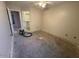 Bare bedroom ready to be customized, showcasing the layout and potential for new flooring and design at 36452 W Velazquez Dr, Maricopa, AZ 85138