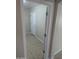 Bright entryway with tile floors and access to front door at 36452 W Velazquez Dr, Maricopa, AZ 85138
