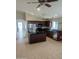 Spacious kitchen featuring an island, dark cabinetry, and stainless steel appliances at 36452 W Velazquez Dr, Maricopa, AZ 85138
