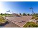 Outdoor basketball court surrounded by lush landscaping offers active community space for residents at 3687 E Blue Spruce Ln, Gilbert, AZ 85298