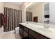 Spacious bathroom with double sinks and a tiled shower/tub combination at 3687 E Blue Spruce Ln, Gilbert, AZ 85298
