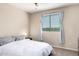 Comfortable bedroom featuring a ceiling fan, and natural lighting at 3687 E Blue Spruce Ln, Gilbert, AZ 85298