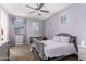 Charming bedroom featuring a ceiling fan, and natural lighting at 3687 E Blue Spruce Ln, Gilbert, AZ 85298