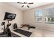 Home gym complete with exercise equipment and natural light at 3687 E Blue Spruce Ln, Gilbert, AZ 85298