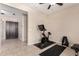 This exercise room offers plenty of open space for equipment and activities at 3687 E Blue Spruce Ln, Gilbert, AZ 85298
