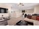 Spacious loft area with a ceiling fan and natural light at 3687 E Blue Spruce Ln, Gilbert, AZ 85298