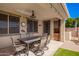 Covered patio featuring an outdoor dining area at 3687 E Blue Spruce Ln, Gilbert, AZ 85298