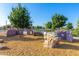 Community playground with climbing structure and slide offers entertainment for neighborhood children at 3687 E Blue Spruce Ln, Gilbert, AZ 85298