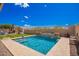 Stunning pool with patio area featuring mature landscaping and seating at 3687 E Blue Spruce Ln, Gilbert, AZ 85298