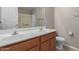 Bathroom featuring double sinks, wood cabinets, and standard showerhead at 3756 E Camden Ave, San Tan Valley, AZ 85140