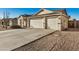 Charming home featuring a three-car garage, neutral color palette, and low maintenance landscaping at 3756 E Camden Ave, San Tan Valley, AZ 85140