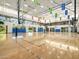 Bright indoor basketball court, perfect for community recreation and promoting an active lifestyle with spacious surroundings at 3806 N Camden Dr, Florence, AZ 85132