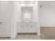 Bathroom featuring a double vanity with a large mirror at 3806 N Camden Dr, Florence, AZ 85132