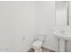 Bathroom featuring white toilet, vanity with sink, and tile flooring at 3806 N Camden Dr, Florence, AZ 85132