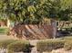 Attractive community center sign with brick pillar and landscaping at 3806 N Camden Dr, Florence, AZ 85132