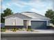 Charming single-story home with a two-car garage, desert landscaping, and neutral color palette at 3806 N Camden Dr, Florence, AZ 85132